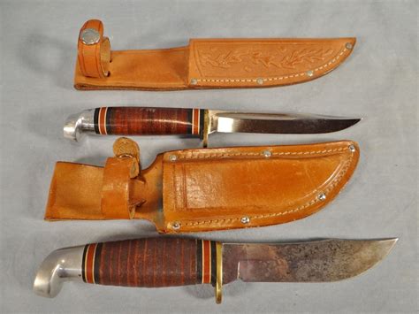 2 Western knives, 4.5" each, w/sheathswestern knives