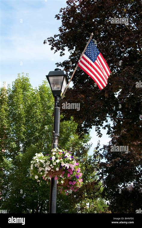 American flag on light pole Stock Photo - Alamy