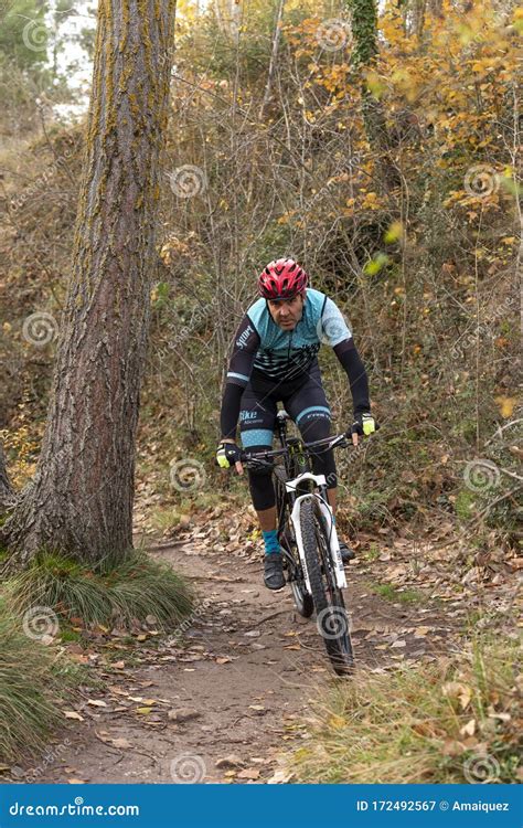 Man Mountain Biking In Forest Editorial Photography Image Of