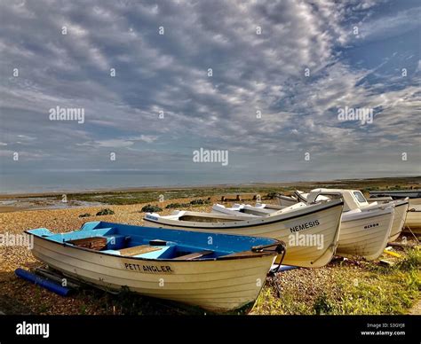 Boats on Pett Level Beach Stock Photo - Alamy