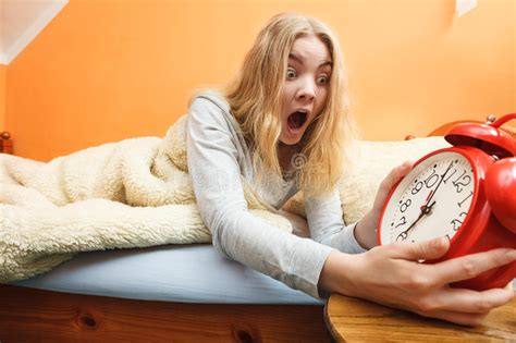 Woman Waking Up Late Turning Off Alarm Clock Stock Image Image Of