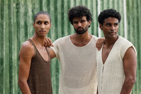 A Group Of Three Men Standing Next To Each Other Photo Elegance Image