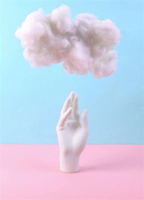 Premium Photo Stand Hand With Cloud On Pastel Pink Blue Background