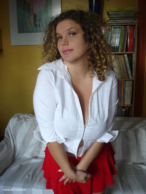 Curly Haired Babe Angel Crisa Exposes Her Mesmerizing Tits And Poses In
