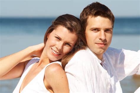 Young Romantic Couple Relaxing On Beach Together Stock Image Image Of Person Beach 13673577