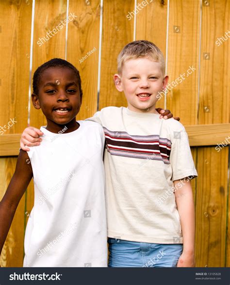 Two Boys Stand Outside Arms Around Foto De Stock 13105828 Shutterstock