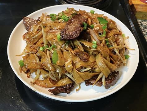 Beef Chow Fun Stir Fried Beef And Rice Noodles With Scallions Bean Sprouts And Dark Soy Sauce