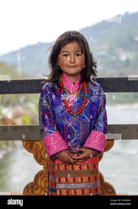 Bhutanese Girl In Kira Traditional Clothing In Punakha Dzong Punakha