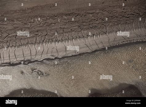 Mud Patterns On Beach Guyana Stock Photo Alamy