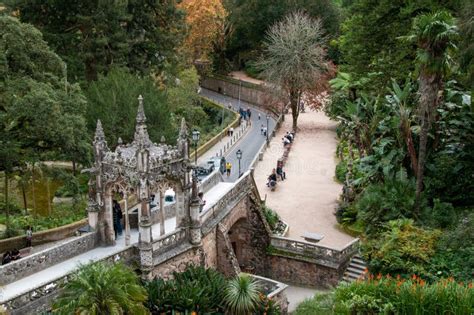 Tourists Visiting The Entrance Gate Of The Quinta Da Regaleira Sintra