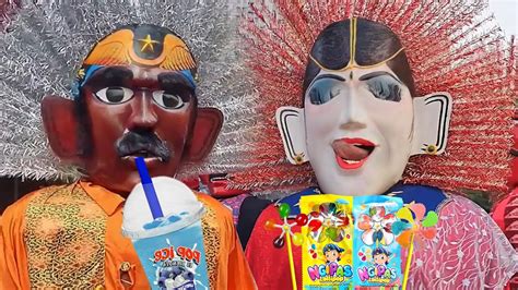 Ondel Ondel Betawi Jajan Permen Kipas Dan Minum Es Pop Ice Blu Berry