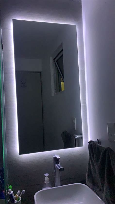 Espejo flotado con luz led de cortesía Luces para espejo de baño