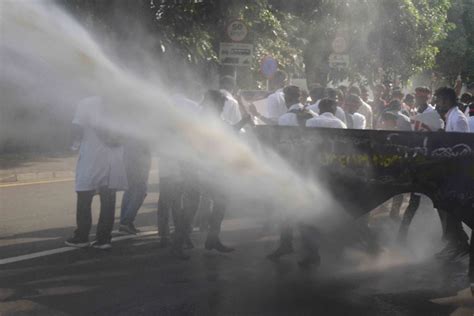 In Pictures Water Cannon Used On Protesting Medical Students Timesonline