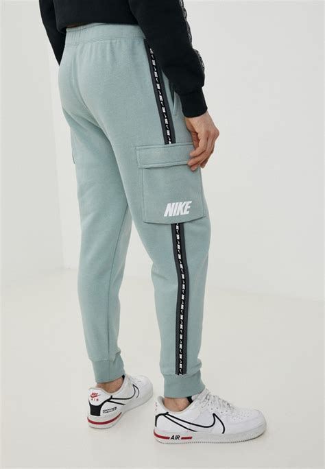 Брюки спортивные Nike M Nsw Repeat Flc Cargo Pant Bb цвет бирюзовый