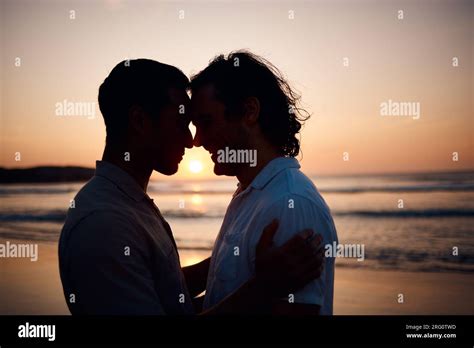 Sunset Embrace And Gay Men On Beach Silhouette And Love On Summer Vacation Together In