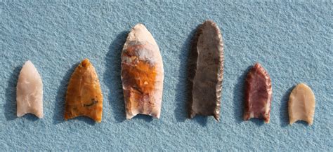 Three Clovis Projectile Points On The Left And Three Folsom Points On