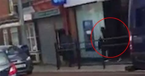 CCTV Of Masked Raiders Inside Bank Released As Police Hunt Three Armed