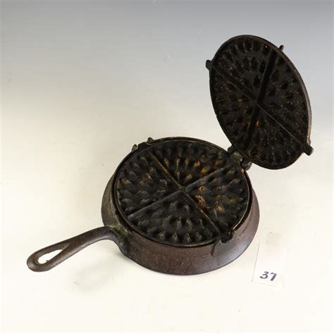 Sold At Auction Antique Cast Iron Waffle Maker