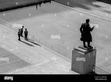 Three Police Officers Stand Guard Outside The Government Palace In