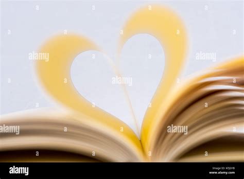 Book Page In Heart Shape Focus On Background Heart Shaped Book Stock