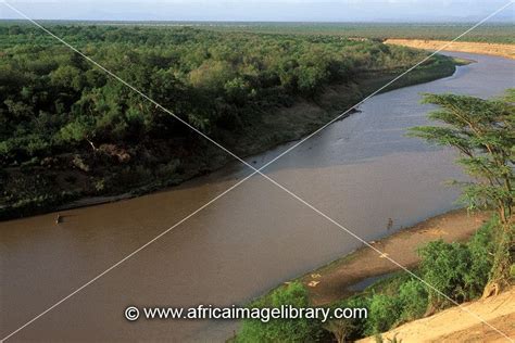 Photos And Pictures Of View Of The Omo River With Boats Crossing Omo