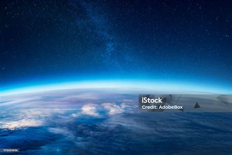 Milky Way Rising Over The Earths Horizon Stock Photo Download Image