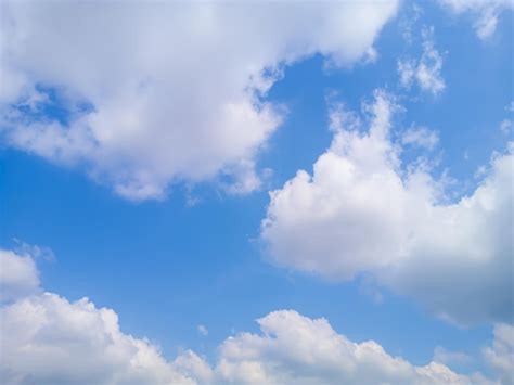 Premium Photo Fluffy White Clouds On A Clear Blue Sky Cloud Sky In