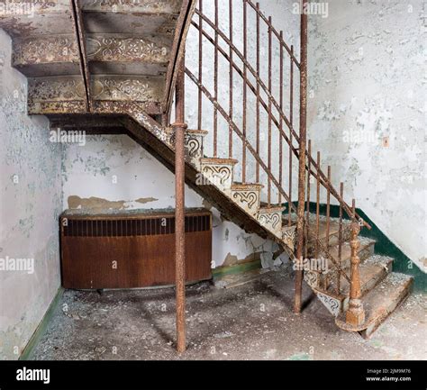 Staircase inside Trans-Allegheny Lunatic Asylum Stock Photo - Alamy