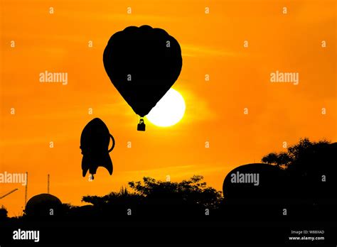 Silhouette Of Hot Air Balloon Over Sunset Background Stock Photo Alamy