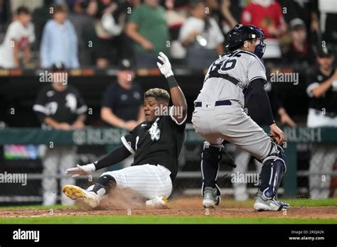 Chicago White Sox's Oscar Colas scores past New York Yankees catcher ...