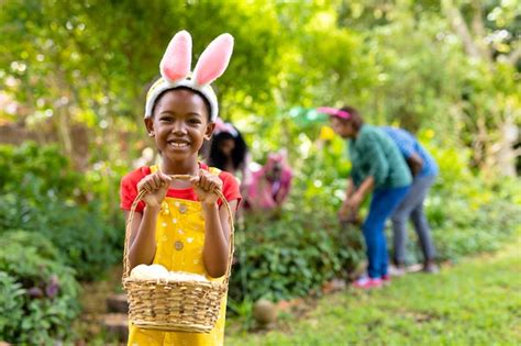 Premium Photo Happy African American Girl In Bunny Ears Carrying