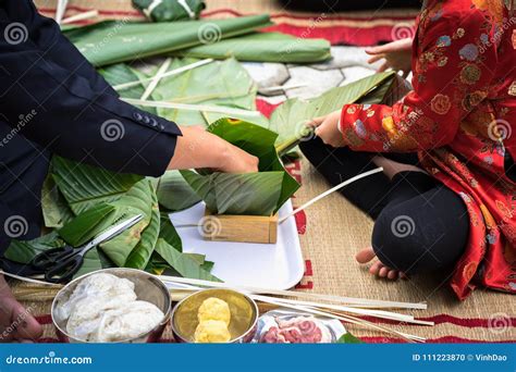 The Son Learning To Make Chung Cake By Hands With His Father Closeup