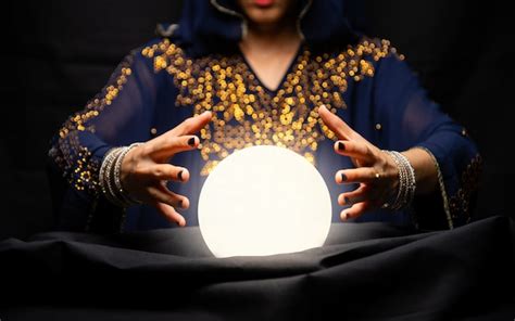 Premium Photo Fortune Tellers Hands With Crystal Ball