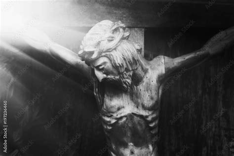 Jesus Christ crucified (an ancient wooden sculpture) Stock Photo ...