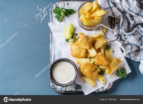 Fish and chips with sauce Stock Photo by ©NatashaBreen 165810482