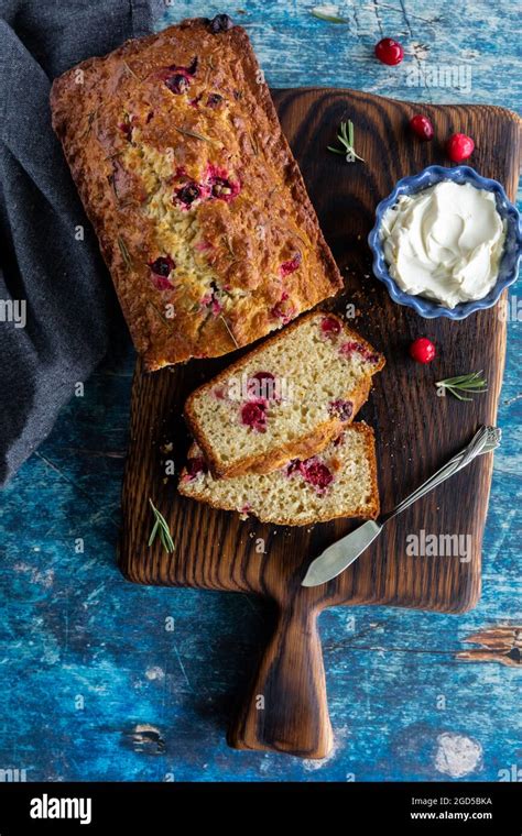 Top Down View Of A Homemade Cranberry Rosemary Bread With Slices Cut