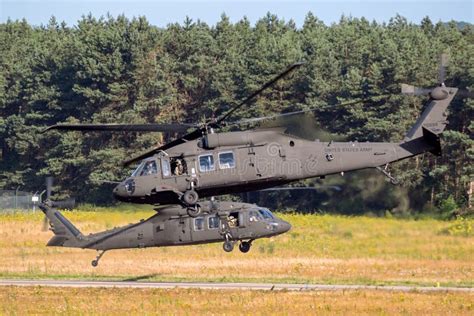 Us Army Sikorsky Uh Black Hawk Helicopters Departing An Air Base In