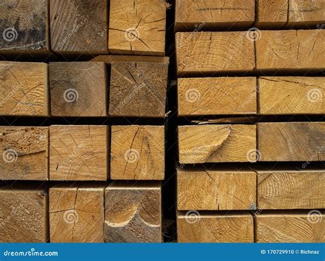 Lots Of Planks Stacked On Top Of Each Other In The Warehouse Lumber