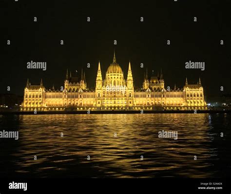 Budapest Parliament view from river Danube night Stock Photo - Alamy