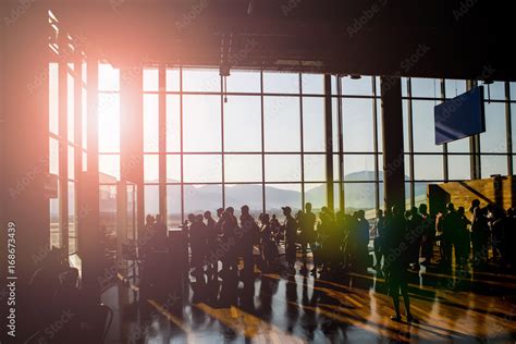 Silhouette crowd people waiting for airplane in airport terminal with ...