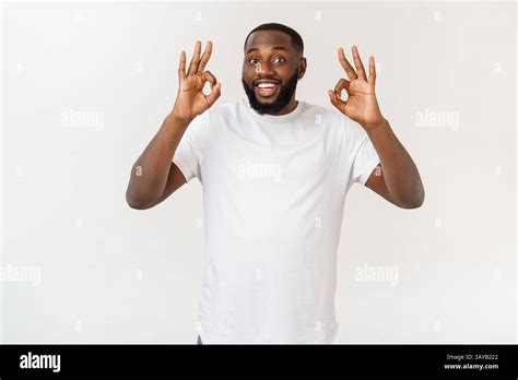 Portrait Of Happy African American Man Showing Ok Sign And Smiling