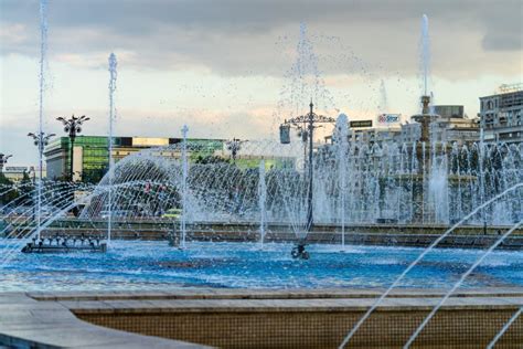 Fountain At Unirii Square In Downtown Of Bucharest Unirii Boulevard In