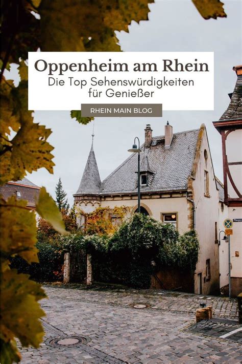 An Old Building With The Words Openen Am Rheinn Written In German On It