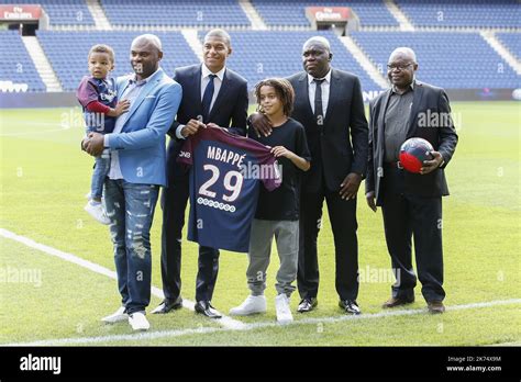 Paris Saint-Germain's new forward Kylian Mbappe together with father ...