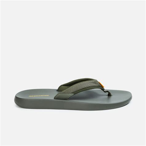 Buy SKECHERS Men Solid Flip-Flops from Skechers at just INR 3499.0