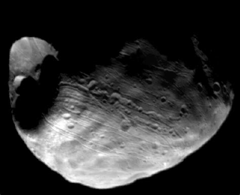 ESA - The giant Stickney crater on Phobos is clearly visible on this ...