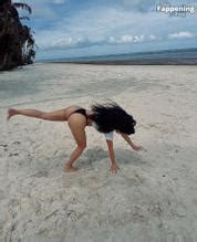 Kim Kardashian Sizzles In Sexy Beach Cartwheels Aznude