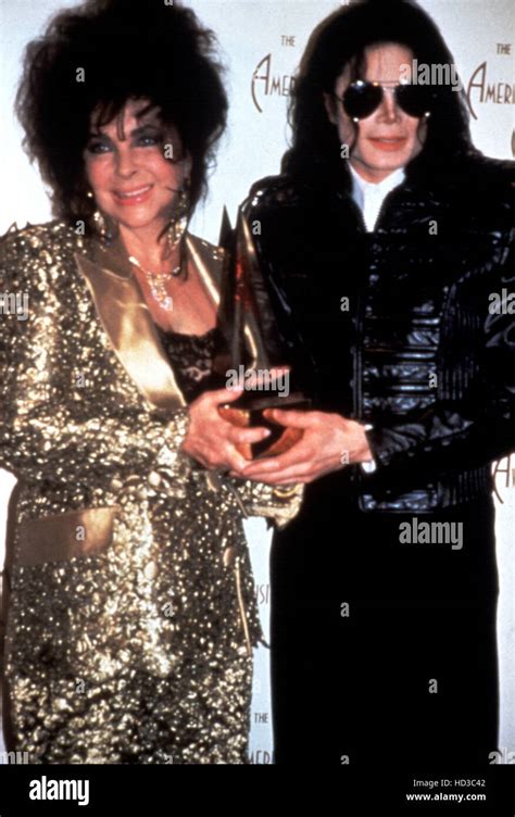 Elizabeth Taylor presenting Michael Jackson with an American Music ...