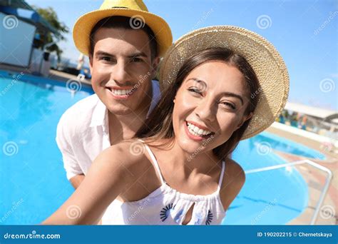 Couple Taking Selfie Near Swimming Pool Summer Vacation Stock Image