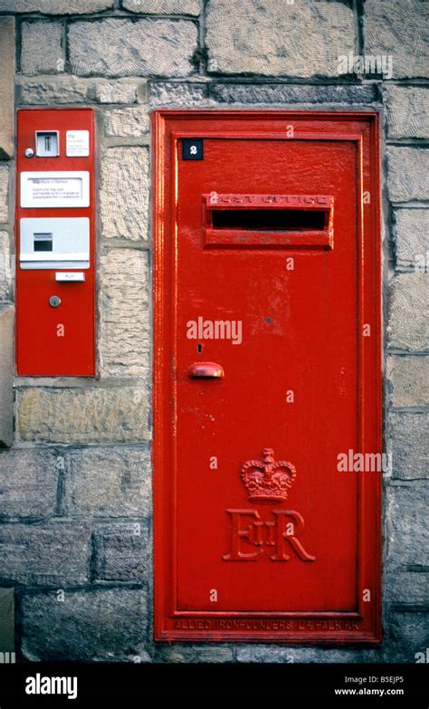 Queen Elizabeth II Post Office letter box with accompanying 50p stamp booklet vending machine ...